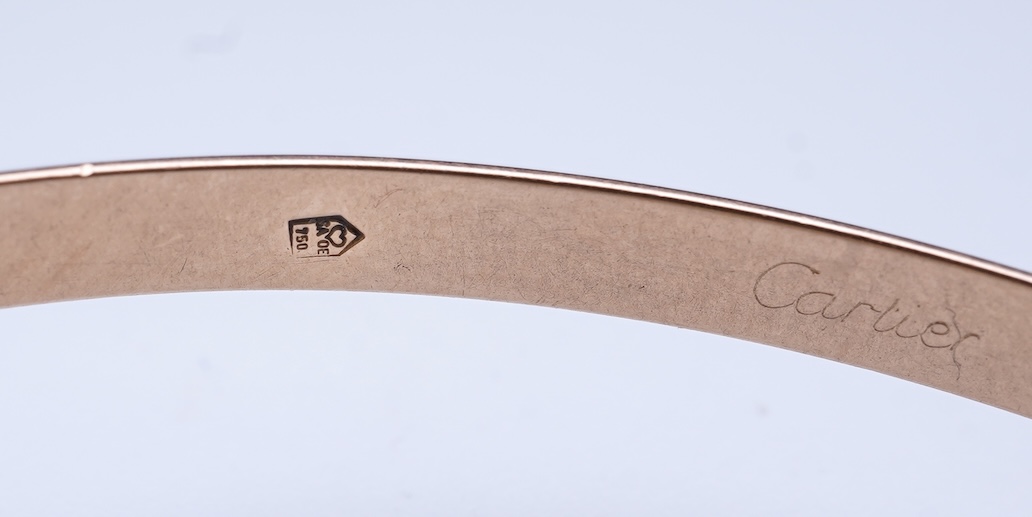 Cartier, a gold bangle, 'Trinity de Cartier'